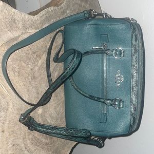 Coach teal and black snake print barrel bag. Brown inside